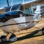 1963 Cessna 205 N8170Z front right quarter view showing propeller, cowling and fixed landing gear