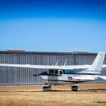 1963 Cessna 205 N8170Z wide right side view at Georgetown Municipal Airport in Texas