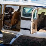 1963 Cessna 205 N8170Z with cabin doors open showing six place seating access