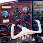 Cessna 205 N8170Z instrument panel and avionics stack viewed from the pilot seat