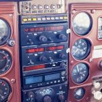 Cessna 205 N8170Z avionics stack with dual Narco nav com radios and engine gauges