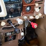 Cessna 205 N8170Z engine control quadrant and elevator trim wheel