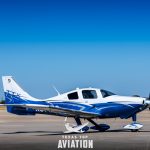 2015 Cessna TTx N576DC parked on the ramp, full side profile showing the Matterhorn White and Steel Blue Pearl paint scheme