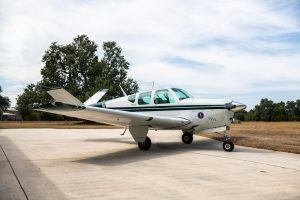 Wide three-quarter view of N474Z, a 1957 Beechcraft H35 Bonanza
