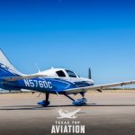 Low front view of 2015 Cessna TTx N576DC against a clear sky