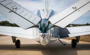 Low rear view of the V-tail and wings of N474Z