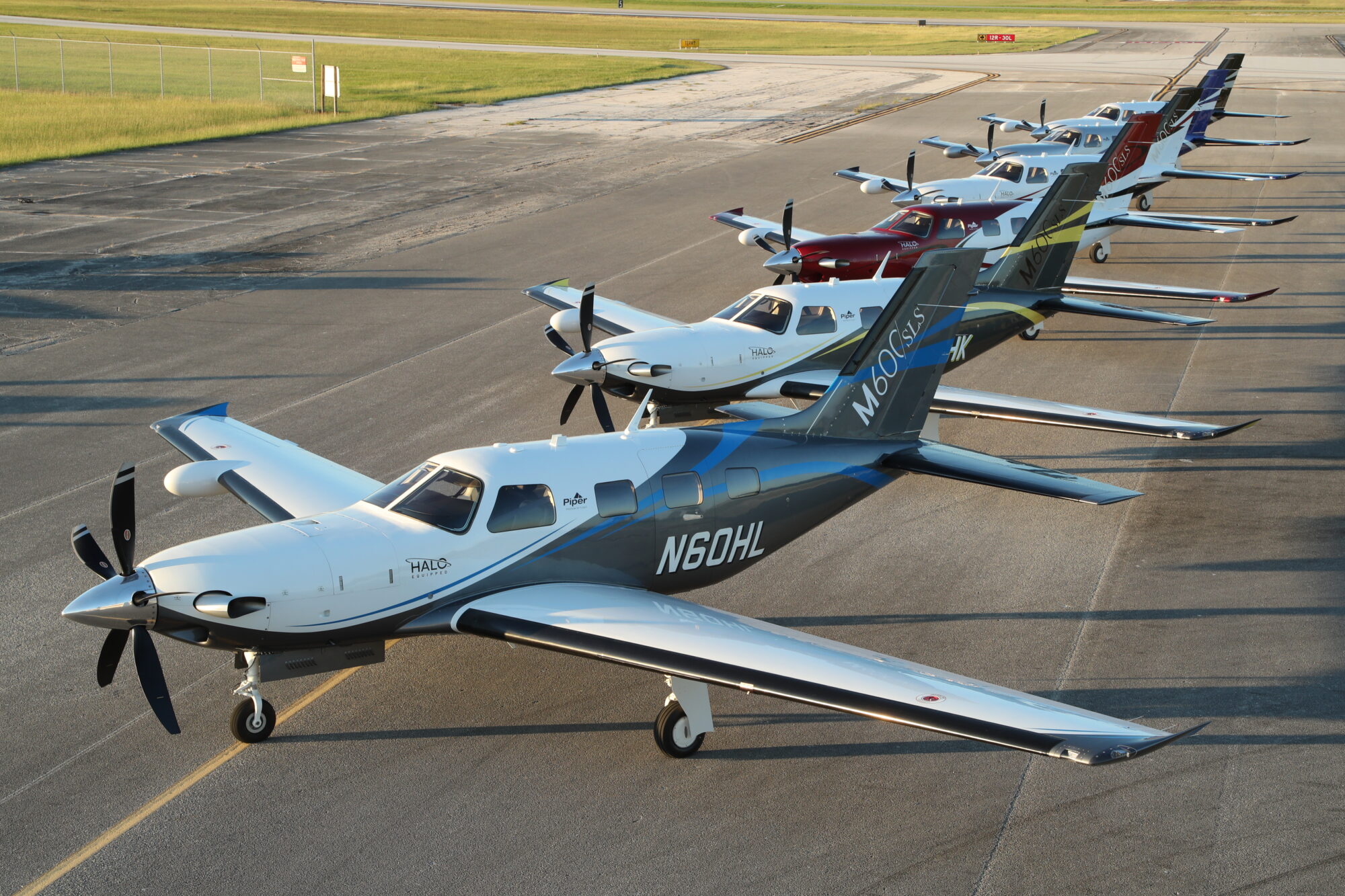 Line of Piper M600 SLS single-engine turboprops on the ramp
