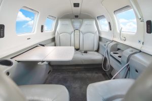 Piper Meridian PA46-500TP N203AP cabin looking aft with the table deployed